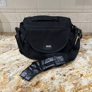NWOT never used in original bag. OPTEKA camera case